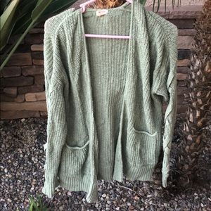 Pale green long cardigan with arm detail